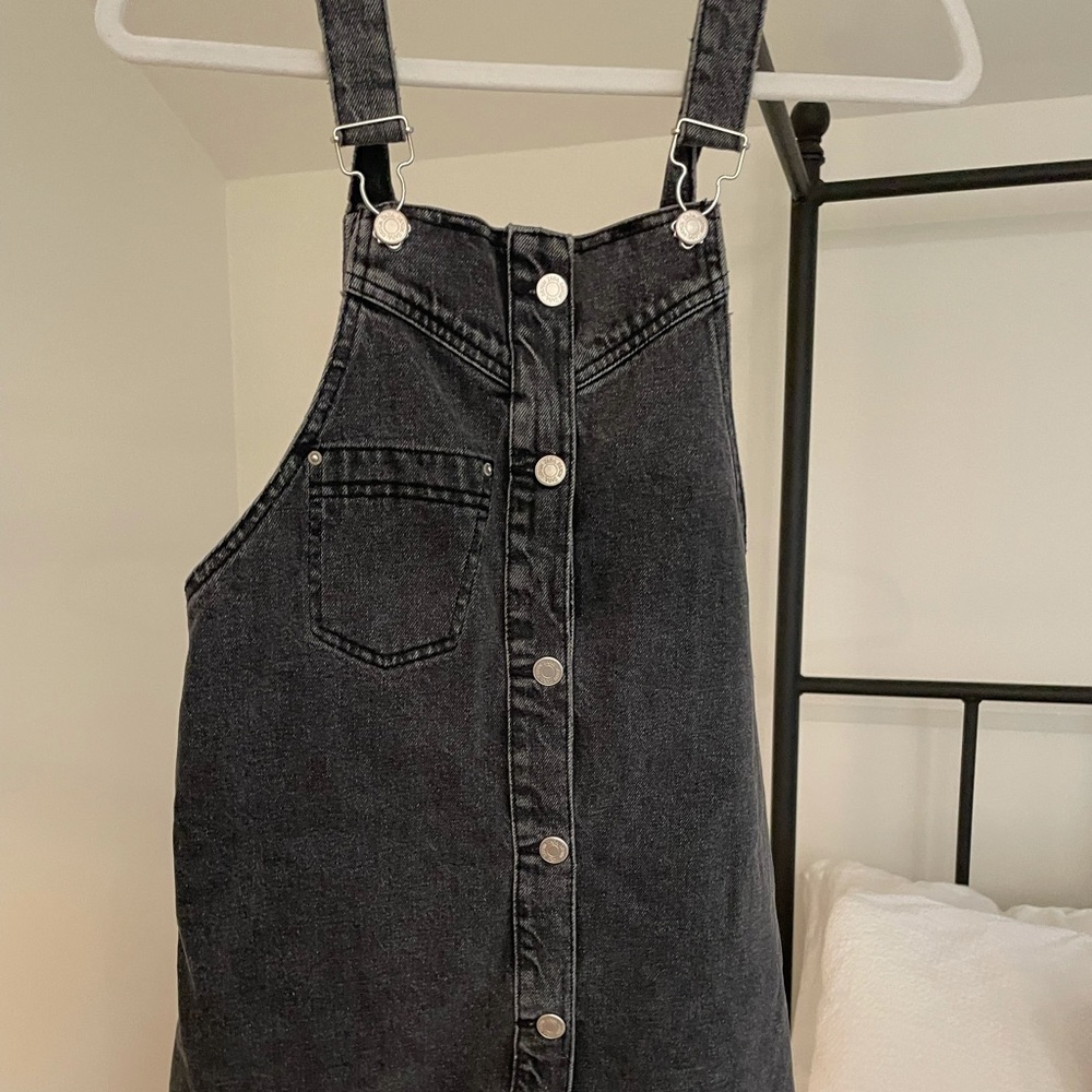 This is a super cute light black denim overalls jumper